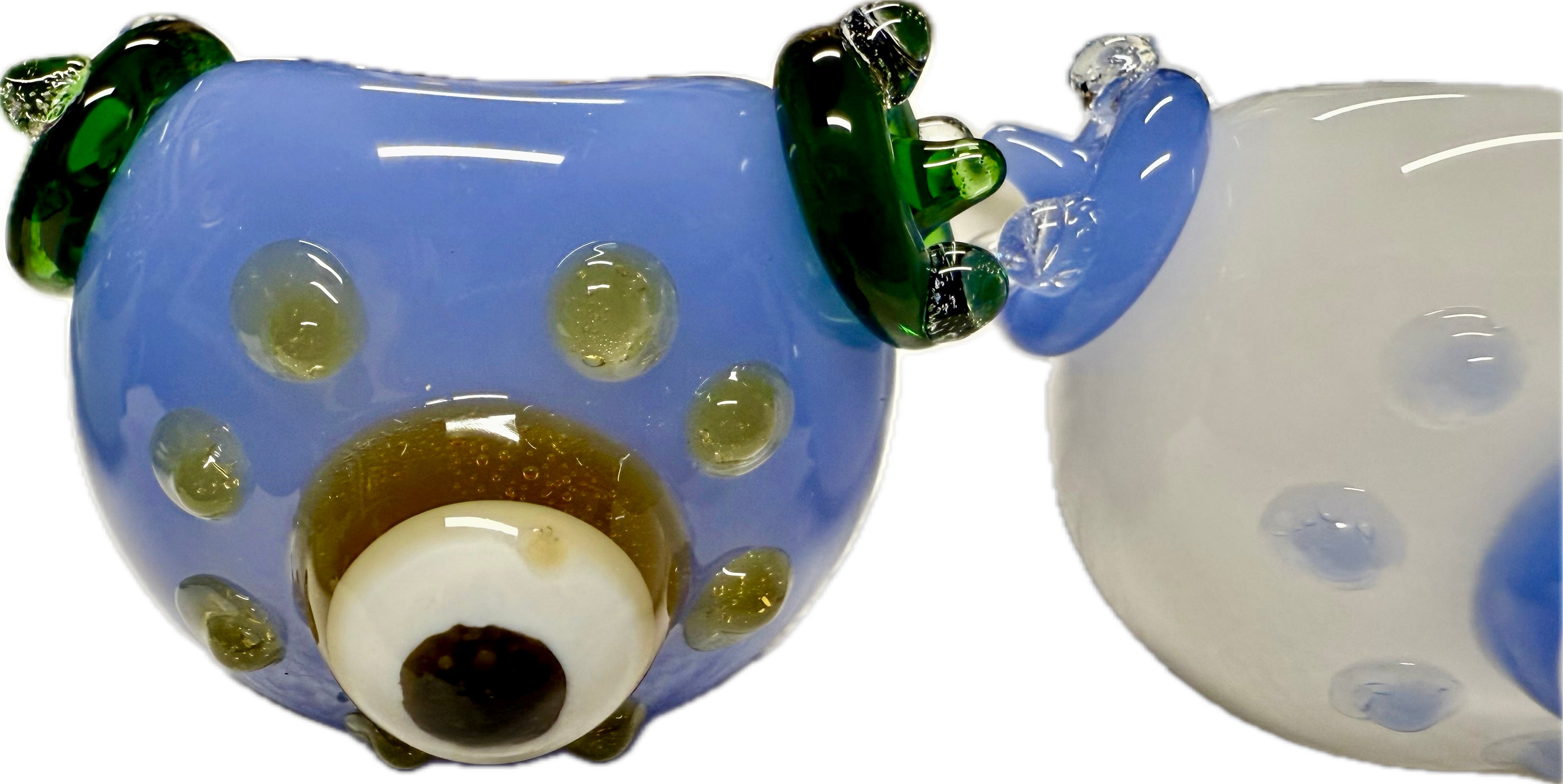 Ripkitty penguin art spoon pipe — periwinkle blue, angled bowl-end view showing evil eye accent and dot pattern on rounded body