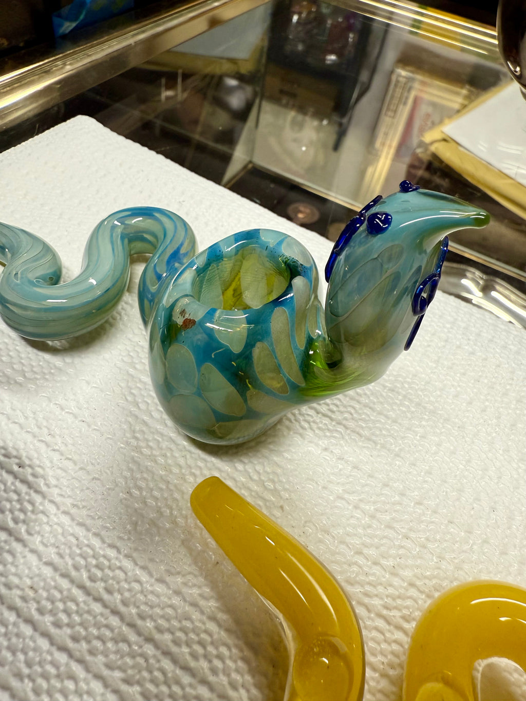 Ripkitty 5" COBRA glass dry herb pipe — angled view showing blue & green coiled snake body and mouthpiece, colors may vary