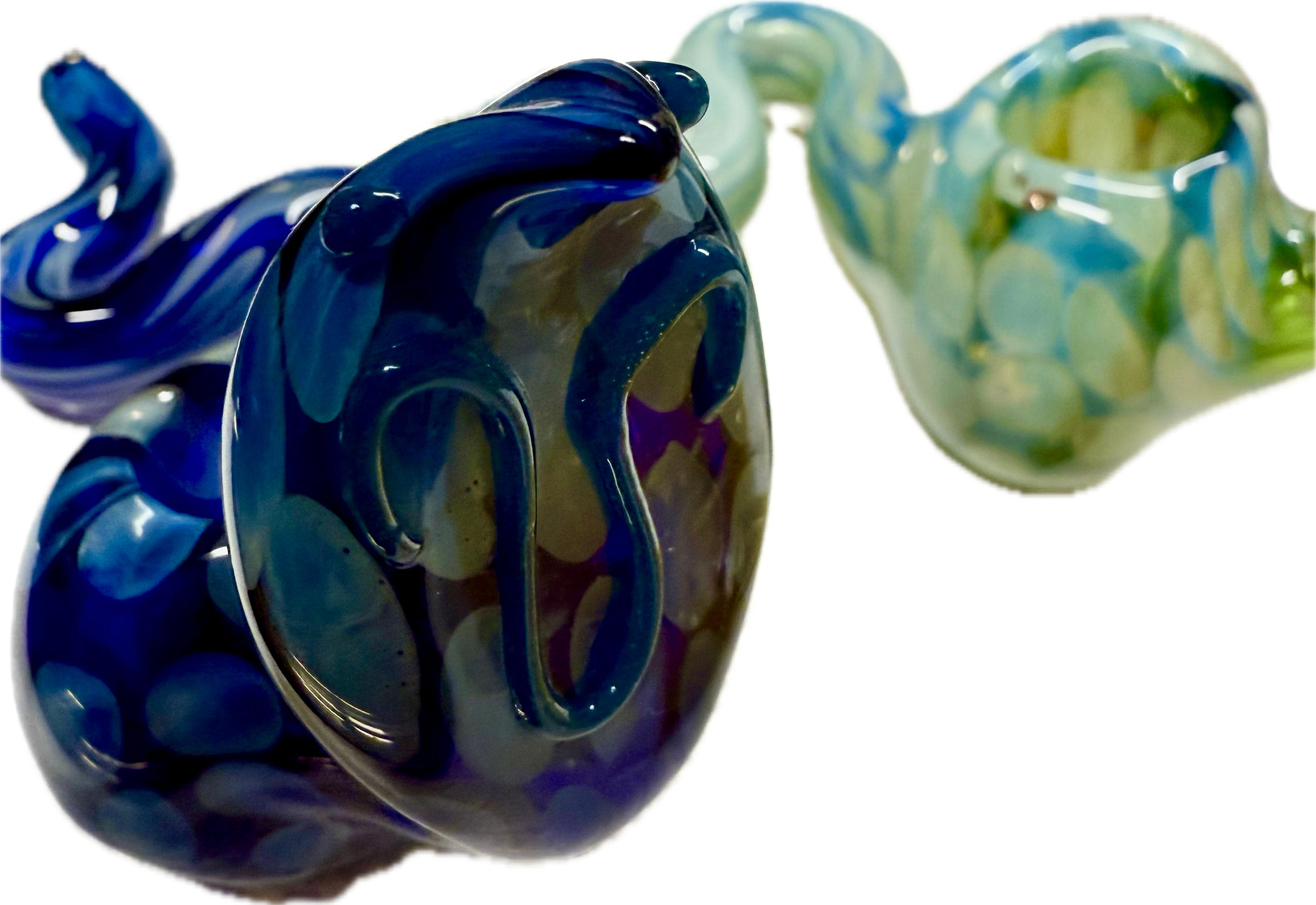 Two Ripkitty 5" COBRA glass pipes side by side — deep navy blue cobra and teal-green cobra — showing color variety, white background