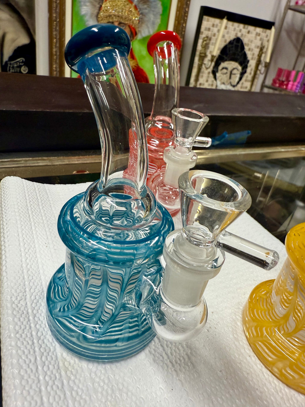 Ripkitty 5" fancy mini bong angled view highlighting decorative rod blue color body and clear glass bowl — colors may vary