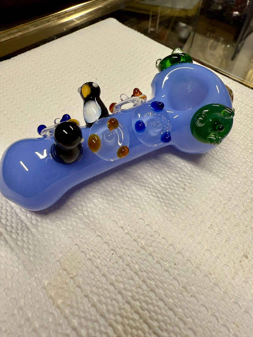 Ripkitty 4.5" penguin art pipe — alternate angle showing flipper side accents and dotted periwinkle body, white background