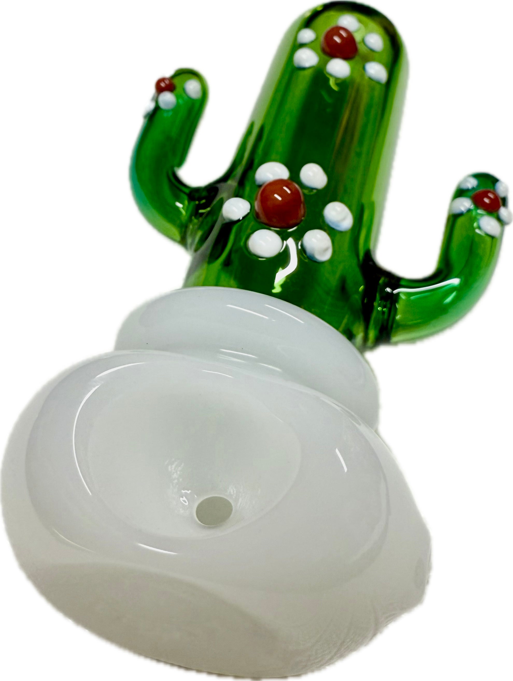 Ripkitty 4.5" cactus glass spoon pipe — overhead angled view showing green saguaro cactus body with white dot nodules and red bead accents, milky white bowl with carb hole visible, white background