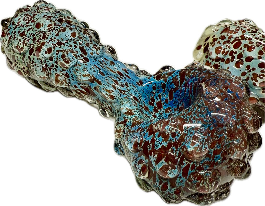  Ripkitty 5" blue spike spoon pipe — close-up angled view of bowl end with teal-blue dominant frit and raised bubble nodule texture, second pipe partially visible in background, white background