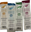 Four packages of Kush Herbal Blend with different colored lids on a white background.