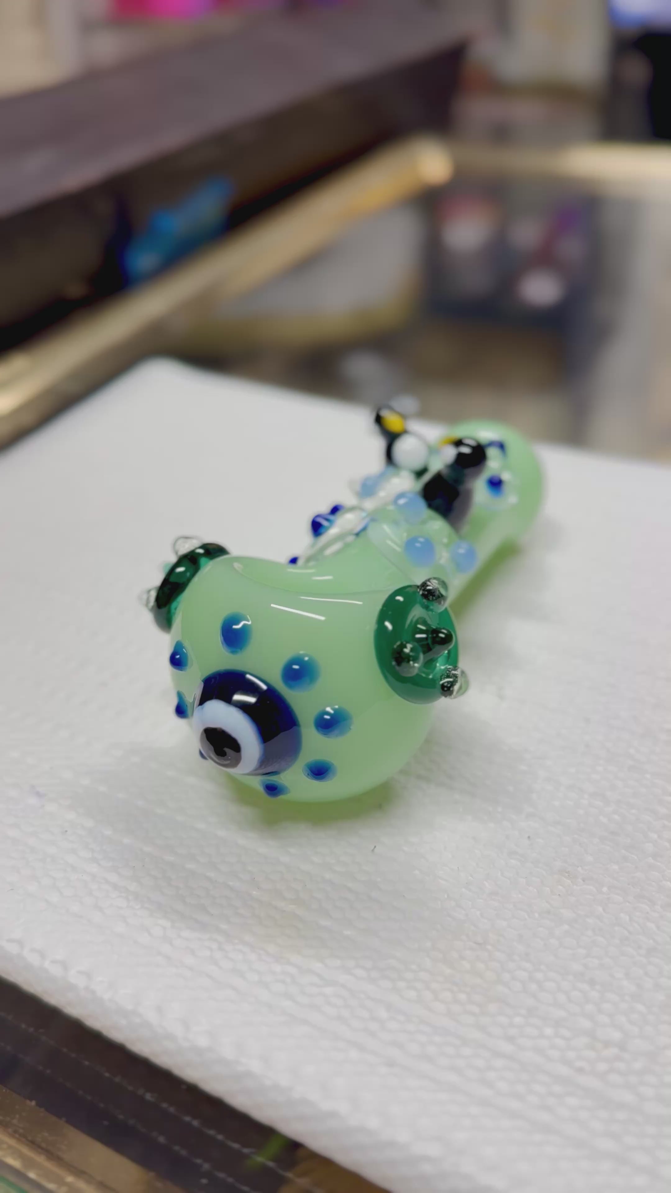 Ripkitty 4.5" penguin art glass spoon pipe — close-up display video highlighting handblown penguin sculpt detail, dot pattern, and bowl chamber